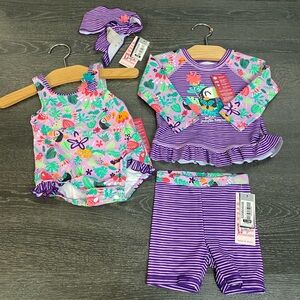 Vibrant Purple and Pink Swim Trunks with Tropical Flair